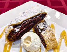 Cherry strudel with ice cream